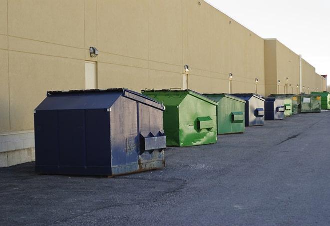 dumpsters lined up waiting to be filled with construction waste in Bolton, CT